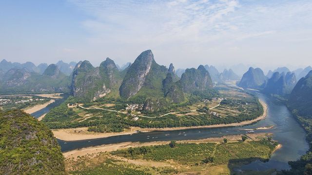 Karst peaks reflected in the Li River near Yangshuo