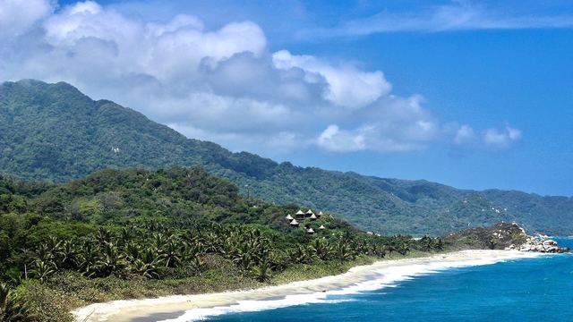 Beach and jungle in Tayrona national park seen from a viewpoint