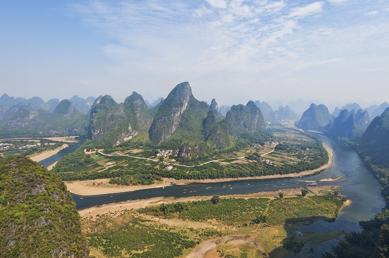 Karst peaks reflected in the Li River near Yangshuo