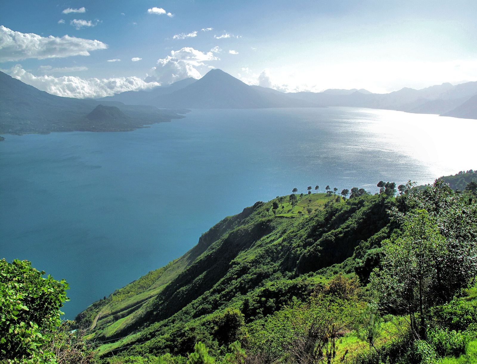 Lake Atitlán with volcanoes in the background