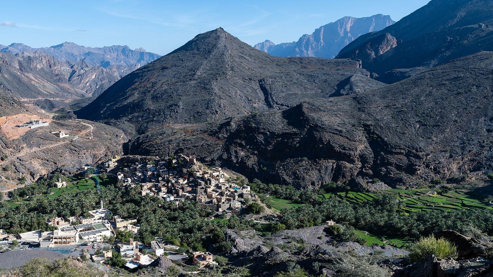The village of Balad Sayt with terraced fields between the mountains